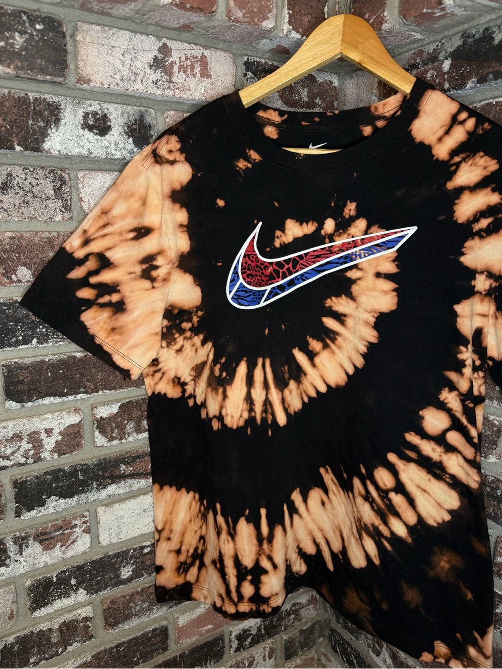 NIKE MULTICOLOR ANIMAL PRINT LOGO BLEACH SPIRAL TIEDYE TSHIRT